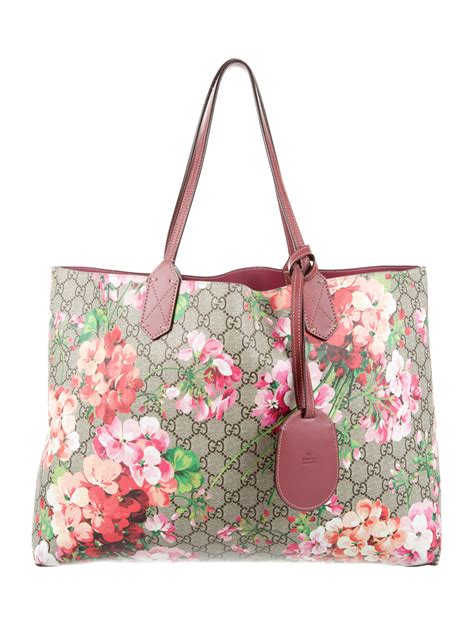 gucci floral reversible tote|More.